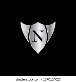 Silver Shield Logo Design for Letter N. Vector Realistic Metallic logo Template Design for Letter N. Silver Metallic Logo. Logo Design for car, safety companies and others.