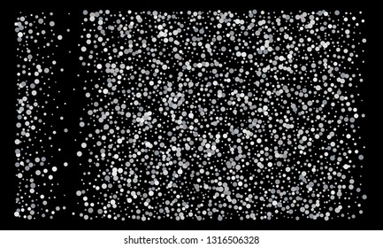 Silver shine of confetti on a black background. Illustration of a drop of shiny particles. Decorative element. Luxury background