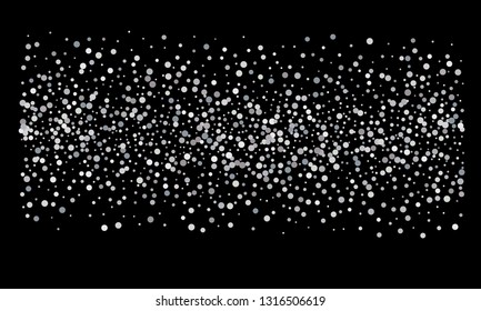 Silver shine of confetti on a black background. Illustration of a drop of shiny particles. Decorative element. Luxury background