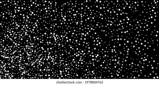 Silver shine of confetti on a black background. Luxury background.