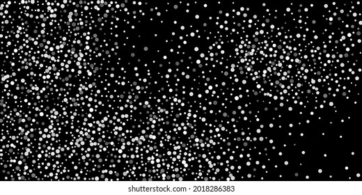 Silver shine of confetti on a black background. Luxury background.