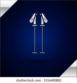 Silver Ski poles icon isolated on dark blue background. Extreme sport. Skiing equipment. Winter sports icon.  Vector Illustration