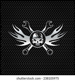 silver skull in helmet with flames and wrenches