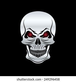 silver skull with red eyes on black background