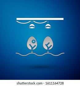 Silver Smart farm with light bulb and plant symbol icon isolated on blue background.  Vector Illustration