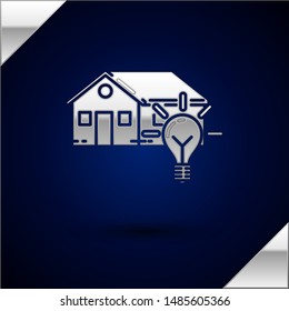 Silver Smart house and light bulb icon isolated on dark blue background.  Vector Illustration
