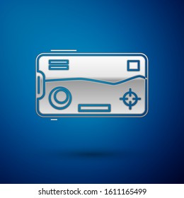 Silver Smartphone and playing in game icon isolated on blue background. Mobile gaming concept.  Vector Illustration