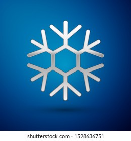 Silver Snowflake icon isolated on blue background.  Vector Illustration