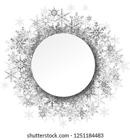 silver snowflakes behind empty round frame for christmas winter greetings on white background