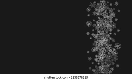 Silver snowflakes frame on black background. Horizontal shiny Christmas and New Year frame for gift certificate, ads, banners, flyers. Falling snow with glitter silver snowflakes for party invite