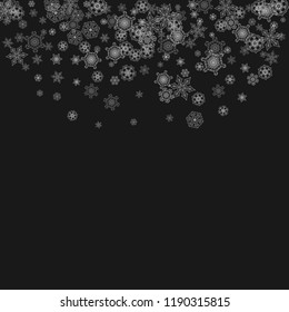Silver snowflakes frame on black background. Winter window. Shiny Christmas and New Year frame for gift certificate, ads, banners, flyers. Falling snow with glitter silver snowflakes for party invite