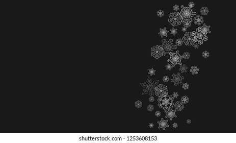 Silver snowflakes frame on black background. Horizontal shiny Christmas and New Year frame for gift certificate, ads, banners, flyers. Falling snow with glitter silver snowflakes for party invite