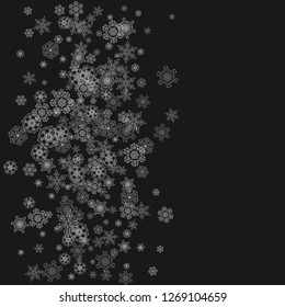 Silver snowflakes frame on black background. Winter window. Shiny Christmas and New Year frame for gift certificate, ads, banners, flyers. Falling snow with glitter silver snowflakes for party invite