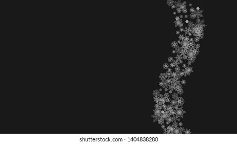 Silver snowflakes frame on black background. Horizontal shiny Christmas and New Year frame for gift certificate, ads, banners, flyers. Falling snow with glitter silver snowflakes for party invite