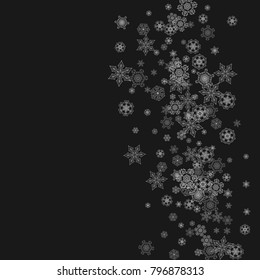 Silver snowflakes frame on black background. Winter window. Shiny Christmas and New Year frame for gift certificate, ads, banners, flyers. Falling snow with glitter silver snowflakes for party invite