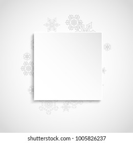 Silver snowflakes frame on white paper background. Christmas and New Year frame for gift certificate, ads, banners, flyers. Falling snow with glitter silver snowflakes for party invite