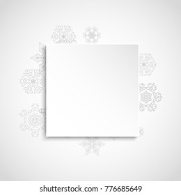 Silver snowflakes frame on white paper background. Christmas and New Year frame for gift certificate, ads, banners, flyers. Falling snow with glitter silver snowflakes for party invite