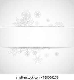 Silver snowflakes frame on white paper background. Christmas and New Year frame for gift certificate, ads, banners, flyers. Falling snow with glitter silver snowflakes for party invite