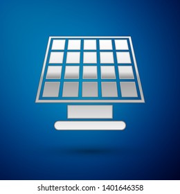 Silver Solar energy panel icon isolated on blue background. Vector Illustration