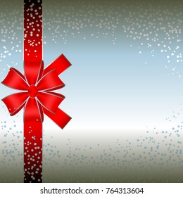 Silver sparkles on a silver background. Red bow. Red ribbon on a gray texture. Postcard.