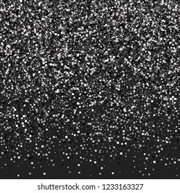 Silver squares on a black background. A shiny background of small steal on a black background. Luxurious pattern with silver dust effect.