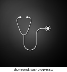 Silver Stethoscope medical instrument icon isolated on black background. Long shadow style. Vector.