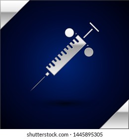 Silver Syringe icon isolated on dark blue background. Syringe for vaccine, vaccination, injection, flu shot. Medical equipment.  Vector Illustration
