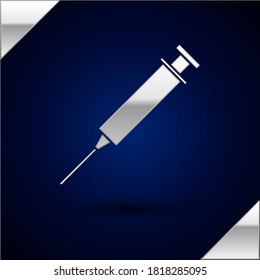 Silver Syringe icon isolated on dark blue background. Syringe for vaccine, vaccination, injection, flu shot. Medical equipment.  Vector Illustration