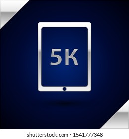 Silver Tablet with text 5k icon isolated on dark blue background.  Vector Illustration