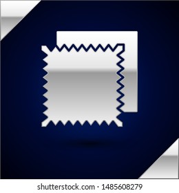 Silver Textile fabric roll icon isolated on dark blue background. Roll, mat, rug, cloth, carpet or paper roll icon.  Vector Illustration