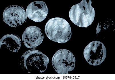 silver texture of the circles form on a black background