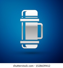 Silver Thermos container icon isolated on blue background. Thermo flask icon. Camping and hiking equipment.  Vector Illustration