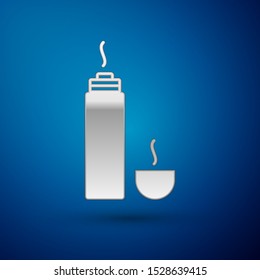 Silver Thermos container icon isolated on blue background. Thermo flask icon. Camping and hiking equipment.  Vector Illustration
