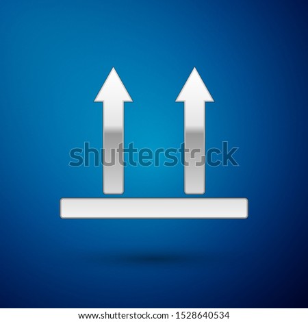 Silver This side up icon isolated on blue background. Two arrows indicating top side of packaging. Cargo handled so these arrows always point up.  Vector Illustration