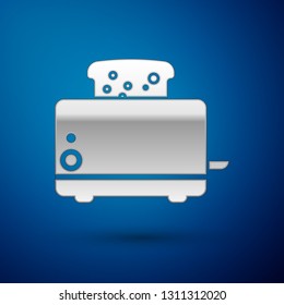 Silver Toaster with toasts icon isolated on blue background. Vector Illustration