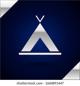 Silver Tourist tent icon isolated on dark blue background. Camping symbol.  Vector Illustration