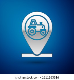 Silver Tractor and location icon isolated on blue background.  Vector Illustration
