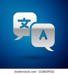 Silver Translator icon isolated on blue background. Foreign language conversation icons in chat speech bubble. Translating concept.  Vector Illustration