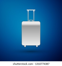 Silver Travel suitcase icon isolated on blue background. Traveling baggage sign. Travel luggage icon. Vector Illustration