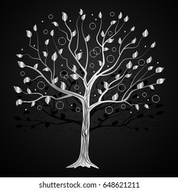 Silver tree with circles on black background.