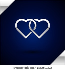 Silver Two Linked Hearts icon isolated on dark blue background. Romantic symbol linked, join, passion and wedding. Valentine day.  Vector Illustration