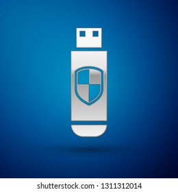 Silver USB flash drive and protection shield icon isolated on blue background. Vector Illustration