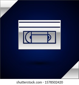 Silver VHS video cassette tape icon isolated on dark blue background.  Vector Illustration