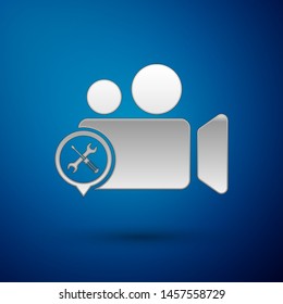 Silver Video camera with screwdriver and wrench icon isolated on blue background. Adjusting, service, setting, maintenance, repair, fixing.  Vector Illustration