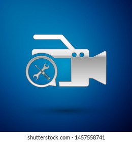 Silver Video camera with screwdriver and wrench icon isolated on blue background. Adjusting, service, setting, maintenance, repair, fixing.  Vector Illustration