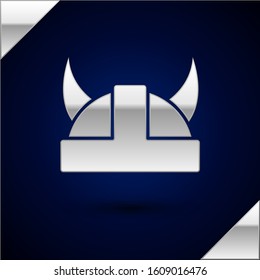 Silver Viking in horned helmet icon isolated on dark blue background.  Vector Illustration