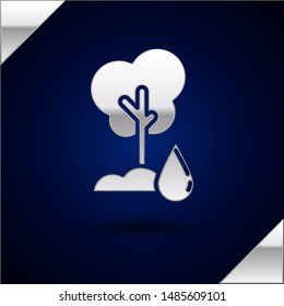 Silver Watering Tree icon isolated on dark blue background. Forest symbol. Irrigation symbol.  Vector Illustration