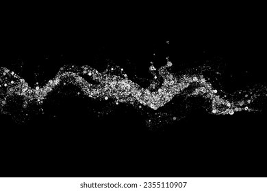 Silver wavy design element with glitter effect on black background, wave of silver sparkles.