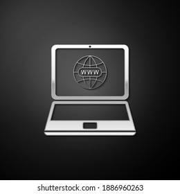 Silver Website on laptop screen icon isolated on black background. Globe on screen of laptop symbol. World wide web symbol. Long shadow style. Vector.