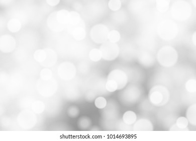Silver and white bokeh background, texture or backdrop